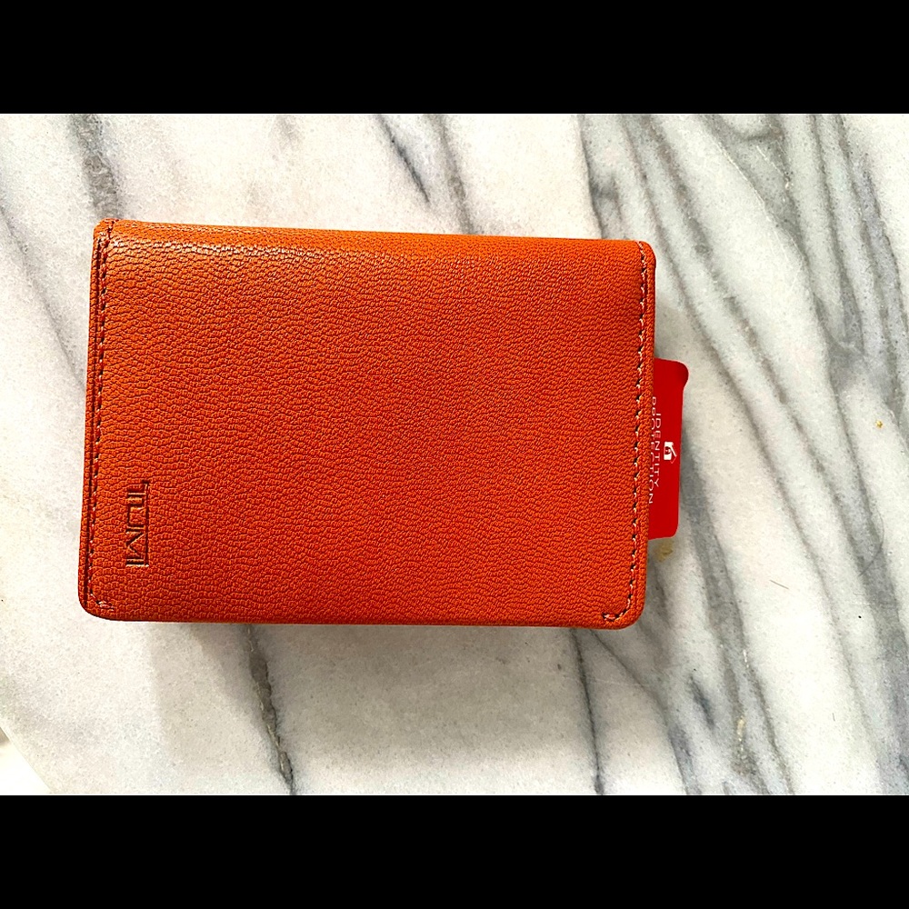 Tumi Card Case  4.125 X 3”. Orange